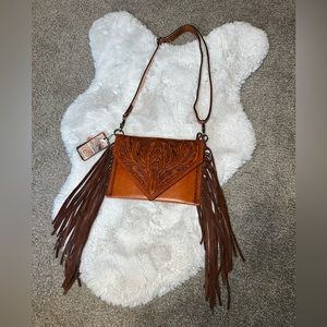 Genuine leather purse with fringe